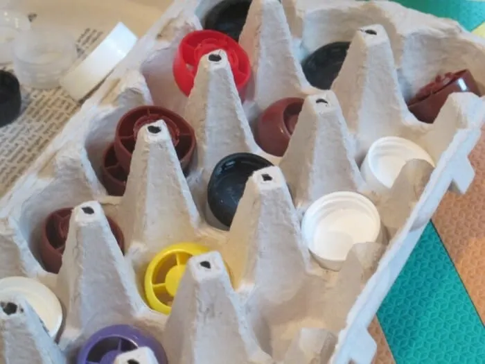 Easy sorting activity with bottle caps & an egg carton
