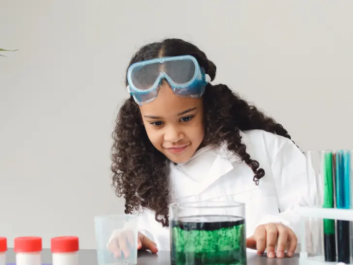 a girl working on a science project