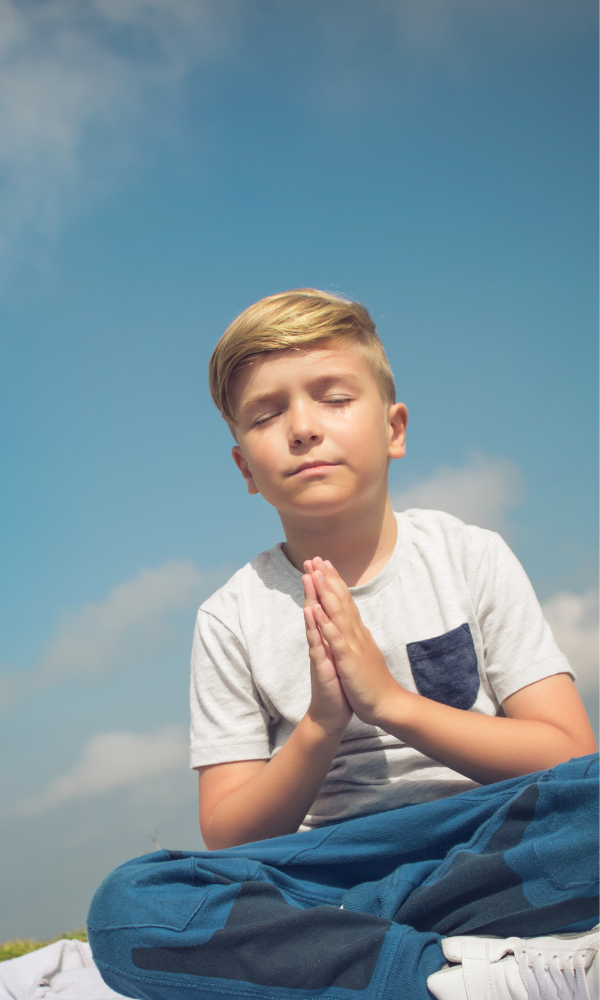 a boy meditating