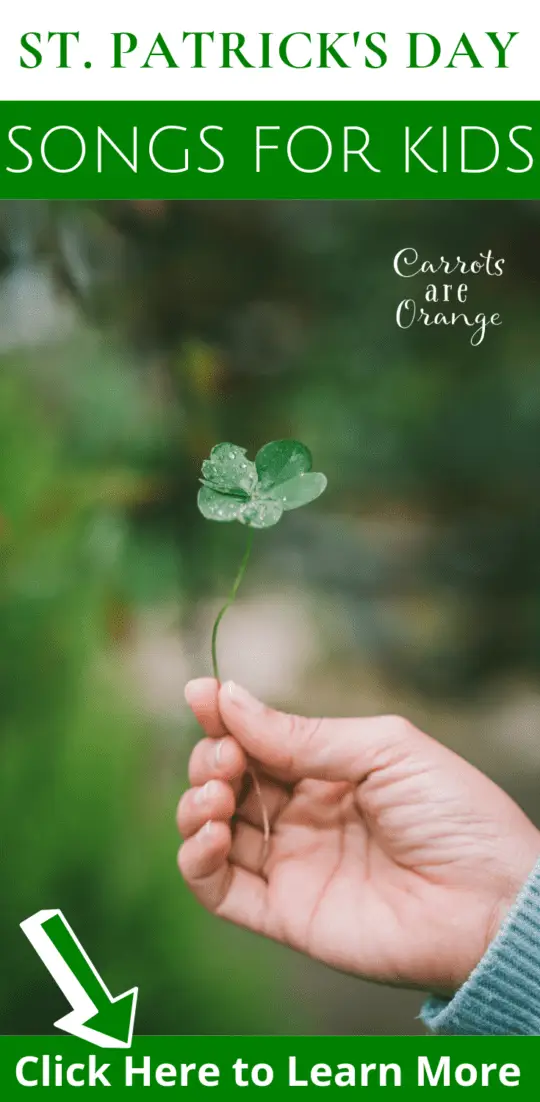 A person holding a four leaf clover