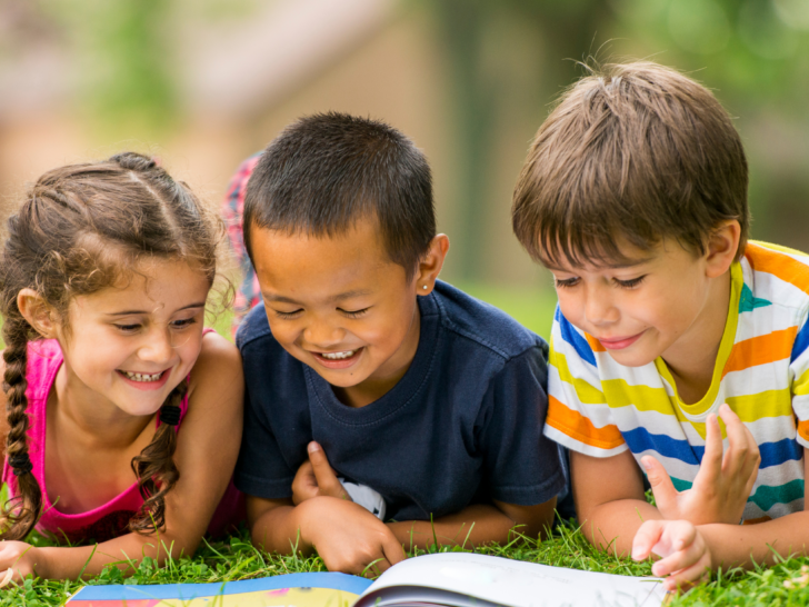 kids reading outside