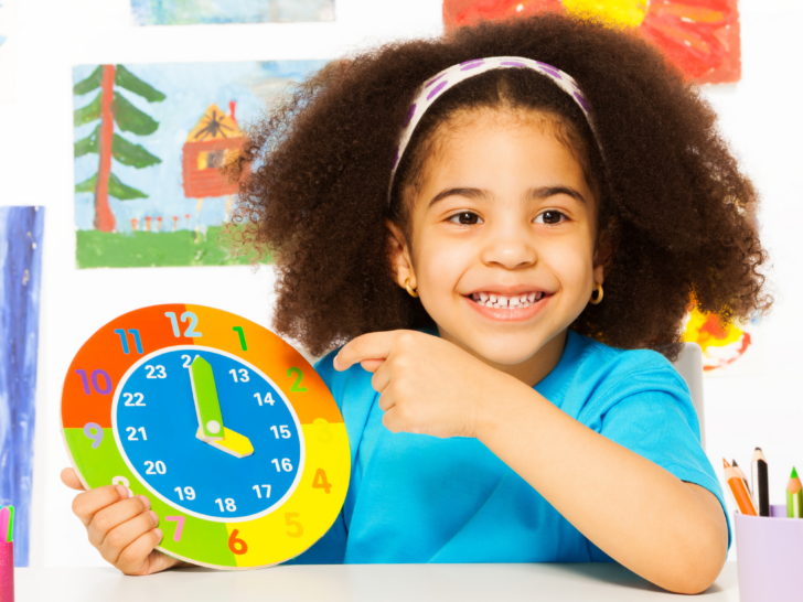 a young girl learning how to tell time