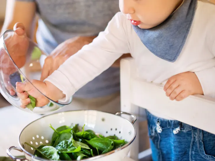 a-child-making-a-salad