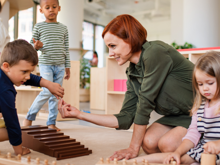 a-montessori-directress-working-with-sensorial-materials-with-children