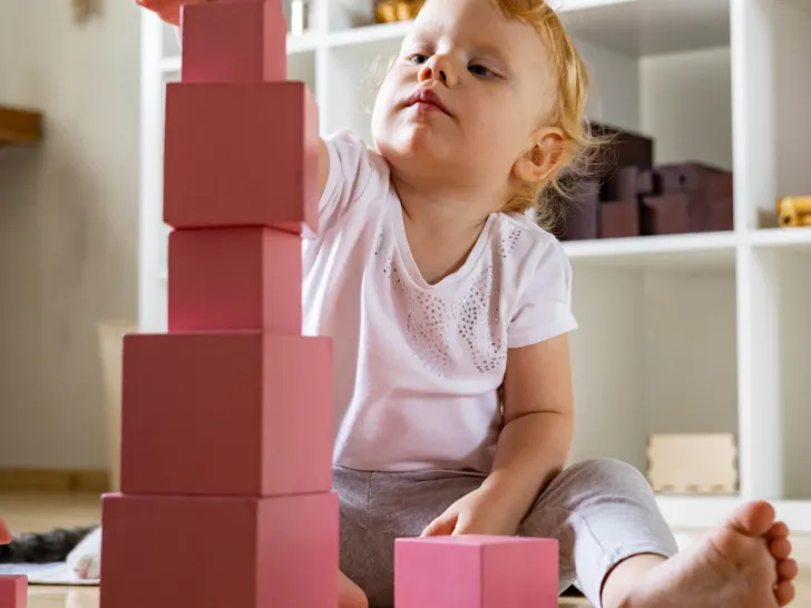 a-young-child-building-the-pink-tower